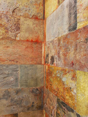 Texture of stone multicolor bricks. Marble background decorative brick, wall tiles made of natural...