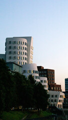 Contemporary Curved Building Against a Clear Sky. High quality photo