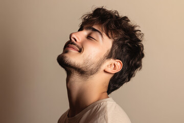 Fototapeta premium A close up of a man's face with his eyes closed