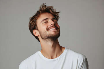 Fototapeta premium A close up of a man's face with his eyes closed