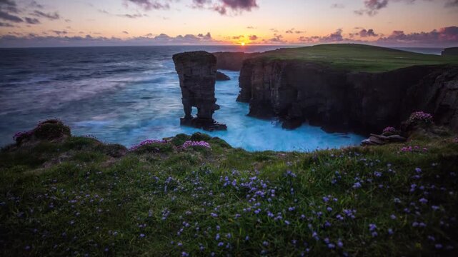 4k time lapse of Yesnaby Stack with Wild Flowers at Sunset in Sandwick Orkney