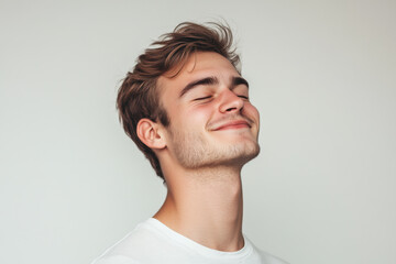 Fototapeta premium A close up of a man's face with his eyes closed