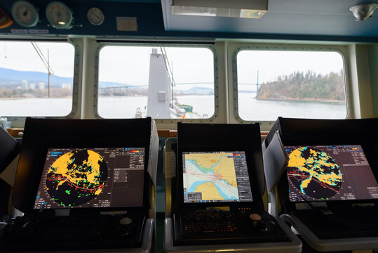 Navigation bridge of cargo vessel entering Vancouver harbour, British Columbia, Canada