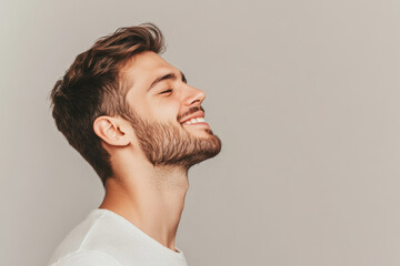 Obraz premium A close up of a man's face with his eyes closed