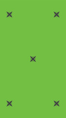 Green screen background, VFX motion tracking markers. Art design green screen backdrop template. Abstract concept video footage replacement tracking markers element.	