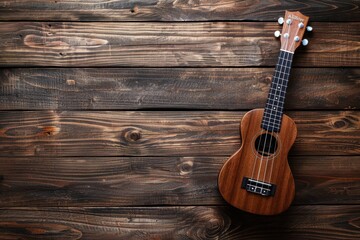 Fototapeta premium Ukulele on dark wood background