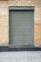 Old door with shutters closed for a long time