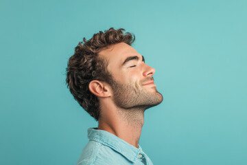 Fototapeta premium A close up of a man's face with his eyes closed