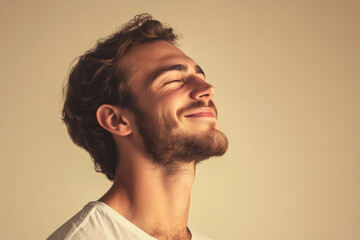 Obraz premium A close up of a man's face with his eyes closed