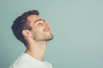Obraz premium A close up of a man's face with his eyes closed