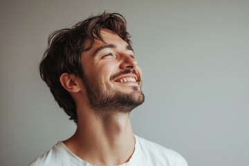 Obraz premium A close up of a man's face with his eyes closed