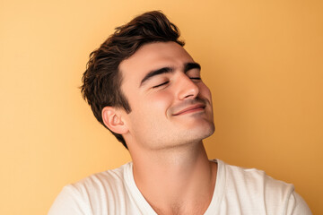 Fototapeta premium A close up of a man's face with his eyes closed