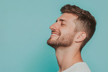 Obraz premium A close up of a man's face with his eyes closed