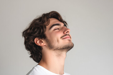 Fototapeta premium A close up of a man's face with his eyes closed