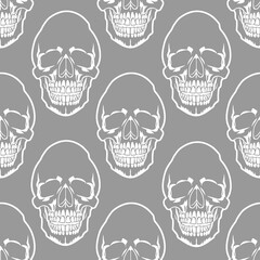 seamless symmetrical pattern of white human skulls on a gray background, texture, design