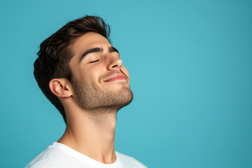 A close up of a man's face with his eyes closed