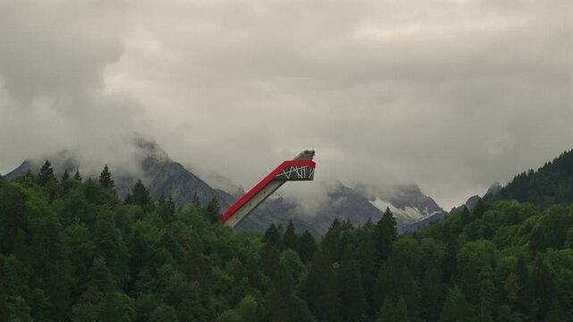 View of Heini-Klopfer ski jump near Allgau village of Oberstdorf in Stillachtal valley Bavaria, Germany. Oberstdorf, Skiflugschanze mit Freibergsee. Heini Klopfer Skiflying jump. Ski jump Freibergsee