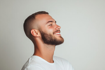 Obraz premium A close up of a man's face with his eyes closed