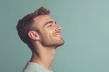 Fototapeta premium A close up of a man's face with his eyes closed