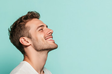 Fototapeta premium A close up of a man's face with his eyes closed