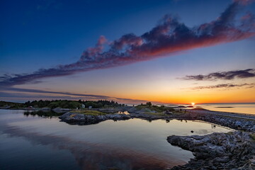 Fototapeta premium Areal shot of the house on an island by the Atlantic road in Norway