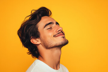 Fototapeta premium A close up of a man's face with his eyes closed