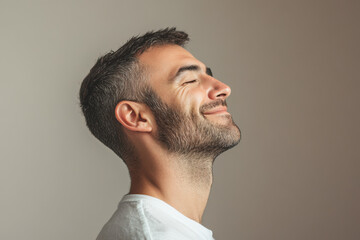 Fototapeta premium A close up of a man's face with his eyes closed