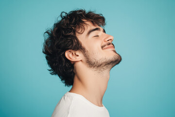 Obraz premium A close up of a man's face with his eyes closed