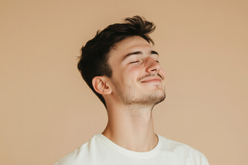Obraz premium A close up of a man's face with his eyes closed