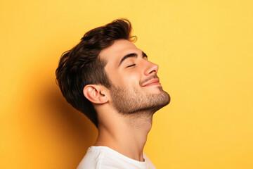 Fototapeta premium A close up of a man's face with his eyes closed