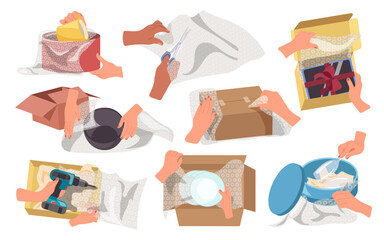 Human hands packing fragile utensil and glasses, digital electronics, hardware in bubble wrap