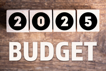Budget 2025 new year on wooden blocks and office business concept background. 2025 Budget planning and allocation concept concept. 2025 New year resolutions, goals