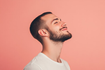 Fototapeta premium A close up of a man's face with his eyes closed