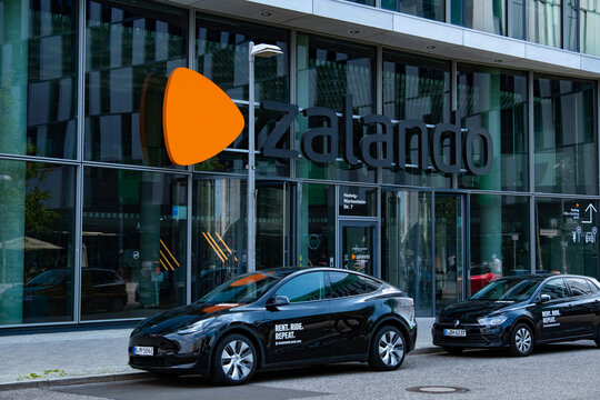 Zalando headquarters, office with iconic orange emblem, delivery shoes, fashionable clothes and cosmetics by mail, storefront, Berlin, Germany - August 15, 2024