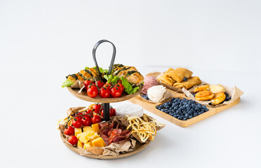 So many with appetizers for wine. Fondue table.