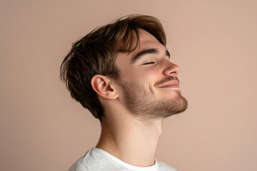 Fototapeta premium A close up of a man's face with her eyes closed