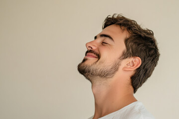 Fototapeta premium A close up of a man's face with her eyes closed