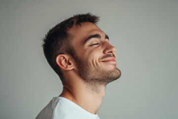 Fototapeta premium A close up of a man's face with his eyes closed