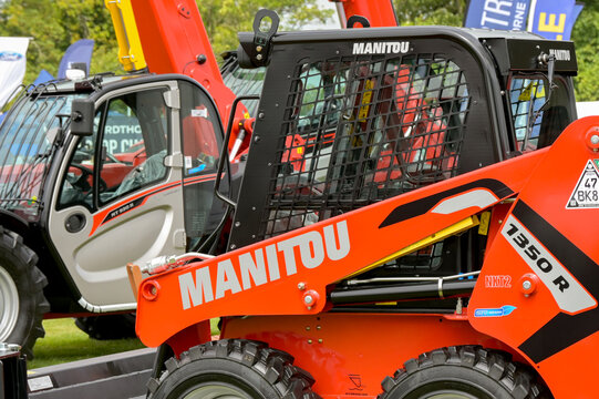 Penllyne, Cowbridge, vale of Glamorgan, Wales, UK - 7 August 2024: Small agricultural tractor manufactured by Manitou on an exhibition stand fat the Vale of Glamorgan show.