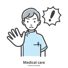 注意している男性の看護師