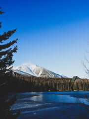 The beautiful surroundings of Štrbské pleso lake and a view of the High Tatras mountains in Slovakia.