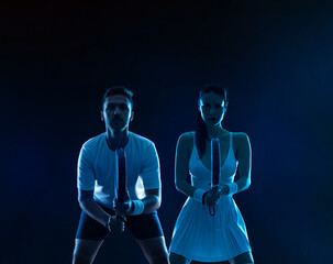 Family team mx. Group of two mix padel tennis players with racket. Woman and man athletes with...