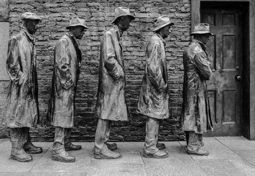 Washington DC - US - Mar 22, 2024 A black and white of people waiting in a bread line from the Great Depression, a part of the Franklin Delano Roosevelt Memorial, located on the Tidal Basin.