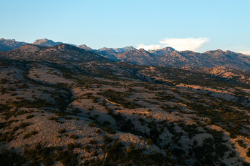 Landscape with rocky mountains and blue sky