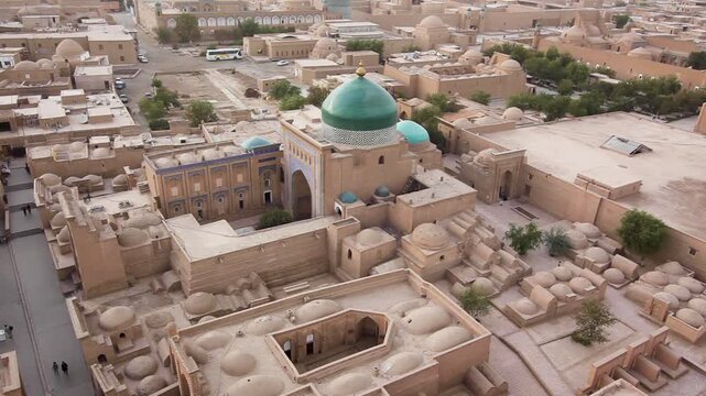 Old town of Khiva, oriental oasis city, clay buildings, alleys and colourful domes, Khiva, Uzbekistan, Asia