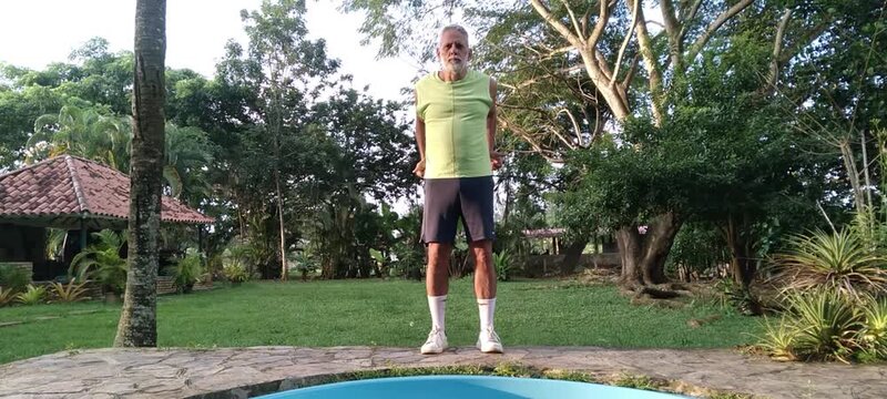 50 year old man doing basic calisthenics exercises