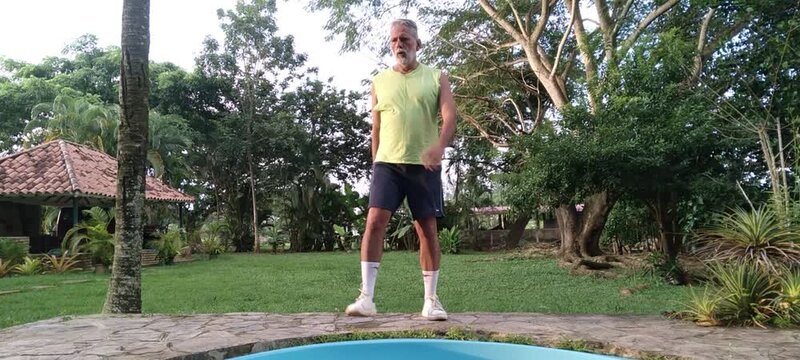 50 year old man doing basic calisthenics exercises