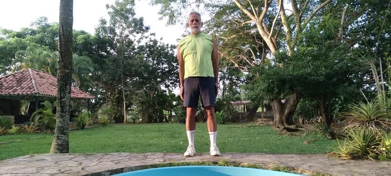 50 year old man doing basic calisthenics exercises