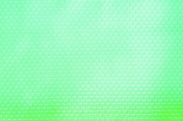 Background painted in blue and green with a honeycomb effect with hexagonal figures.