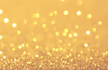 Shimmering Golden Glitter Surface with Countless Sparkles for a Radiant Effect